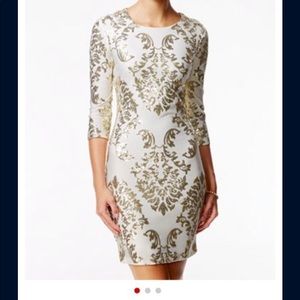 White and gold form fitting dress